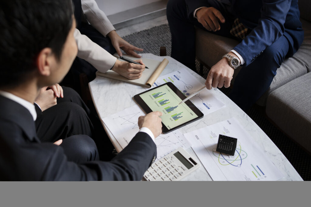 business people working with ipad high angle (1)